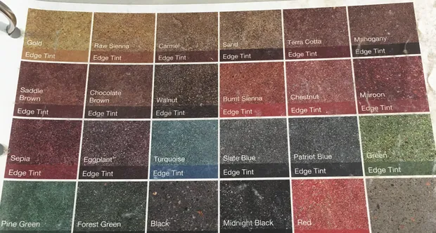 Stain color chart showing twenty-four stained concrete samples from gold and sienna through maroon, turquoise and black