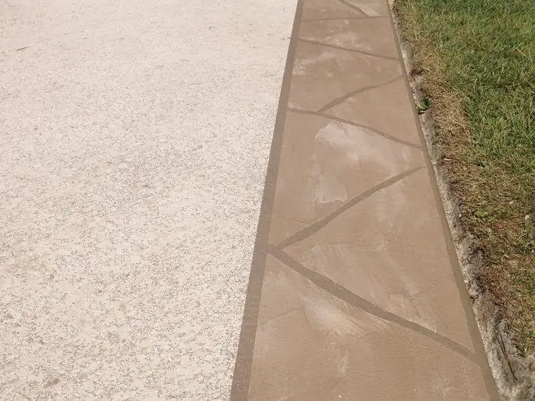 Tan textured overlay with a flagstone joint line cut into it