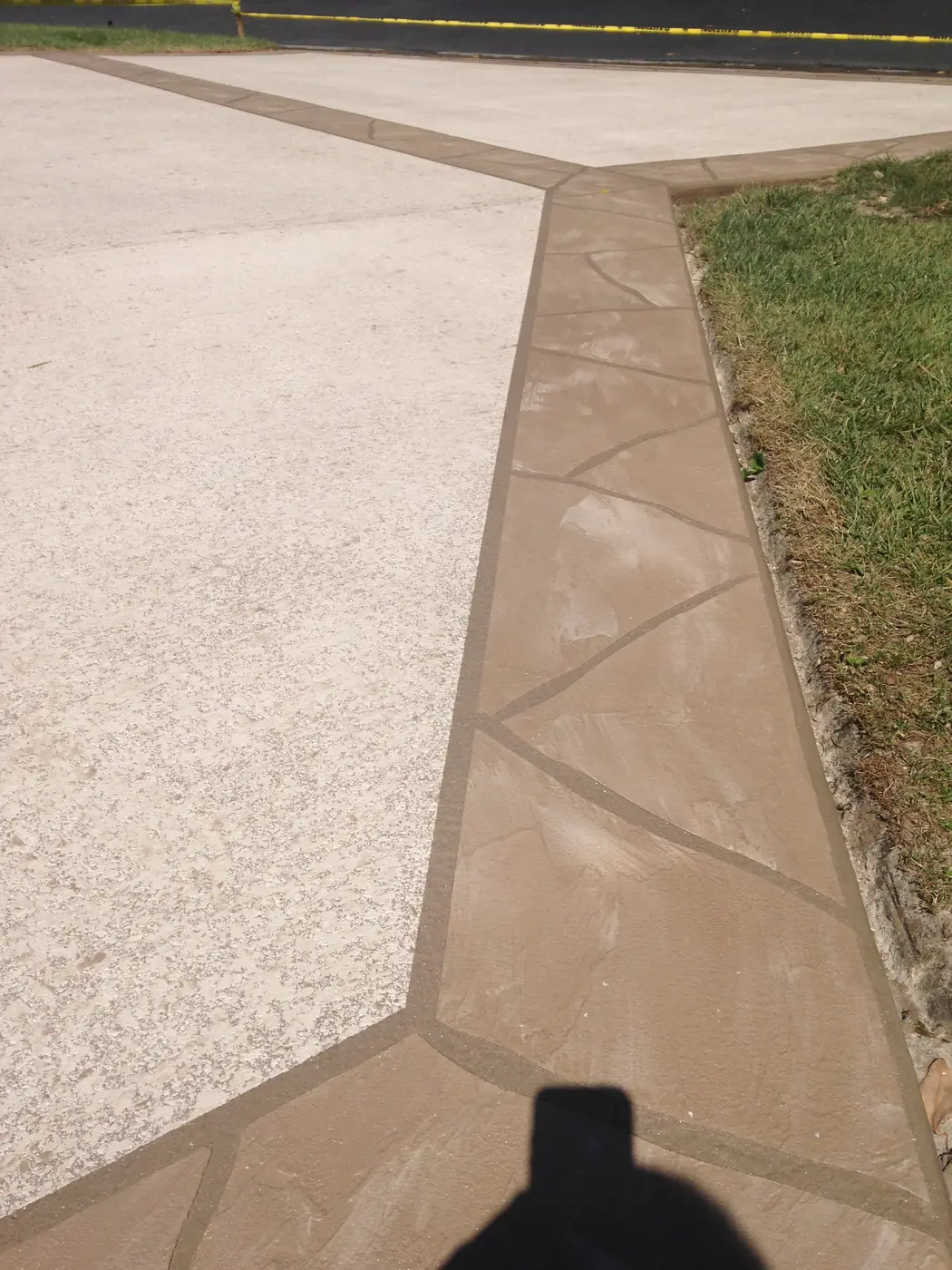 Tan textured overlay with a flagstone joint line cut into it