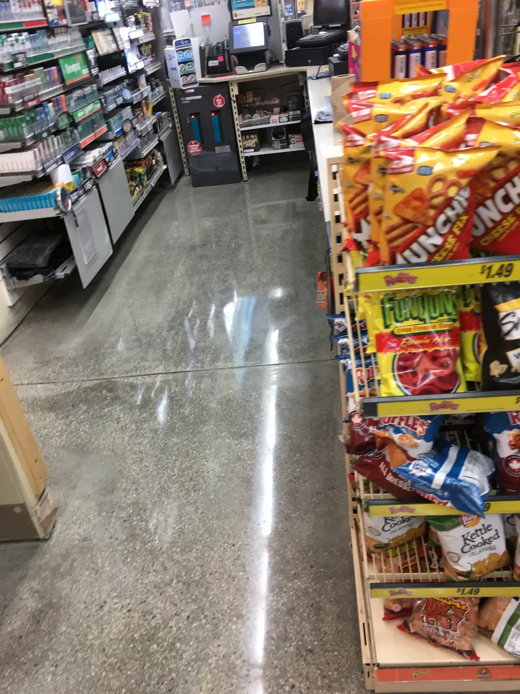 Polished concrete aisle floor in a convenience store