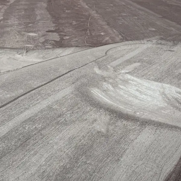 Close view of a ground concrete surface after an old coating was taken off
