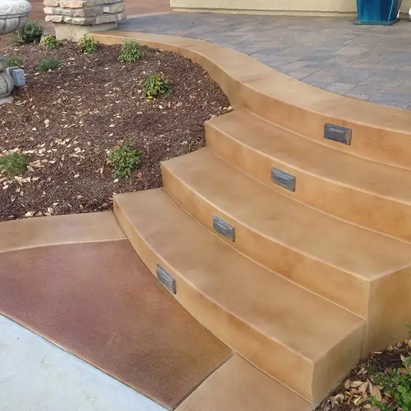 Tan and gold stained steps curving up to a walkway
