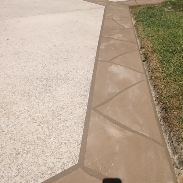 Tan textured overlay with a flagstone joint line cut into it