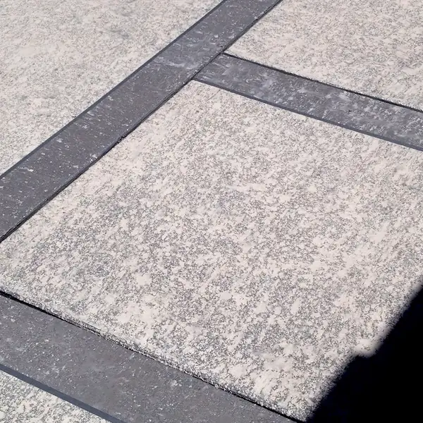 Gray knockdown textured deck framed by a dark charcoal border