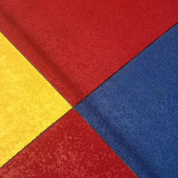 Four color quadrants of splash pad coating meeting at a center point
